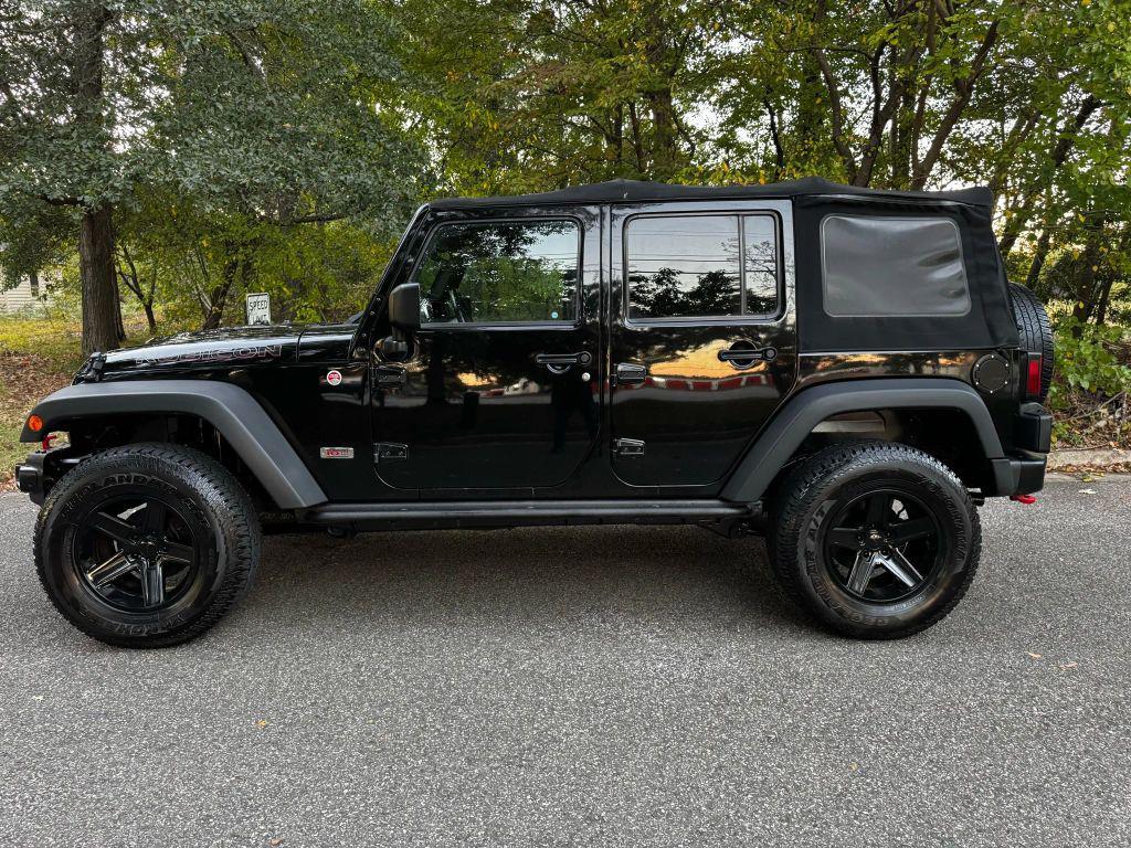 used 2013 Jeep Wrangler Unlimited car, priced at $12,995