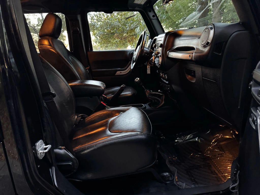 used 2013 Jeep Wrangler Unlimited car, priced at $12,995