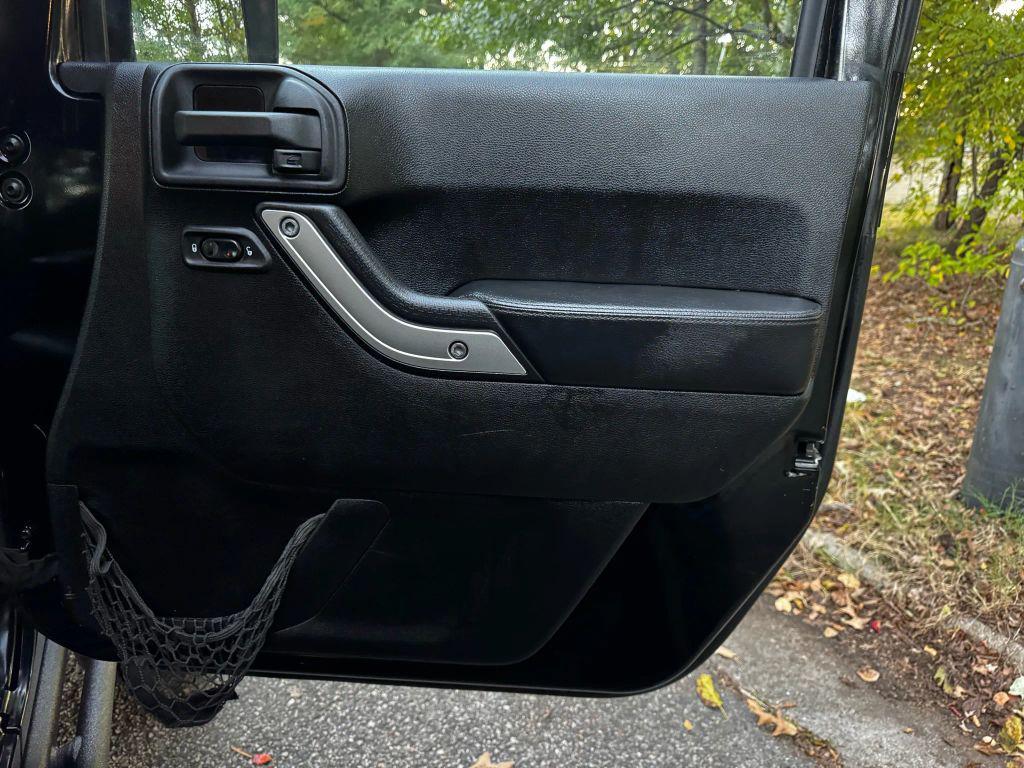 used 2013 Jeep Wrangler Unlimited car, priced at $12,995