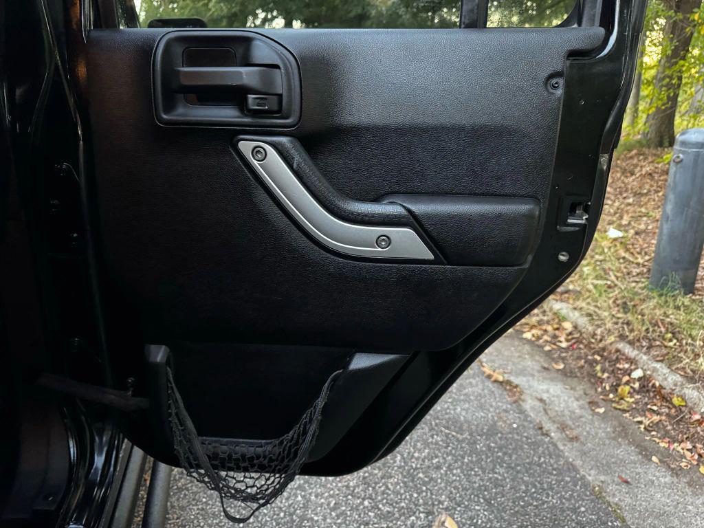 used 2013 Jeep Wrangler Unlimited car, priced at $12,995