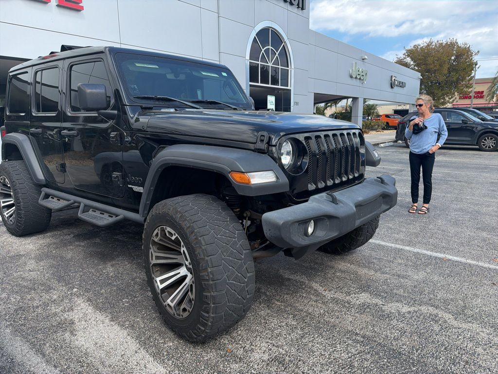 used 2021 Jeep Wrangler Unlimited car, priced at $25,900
