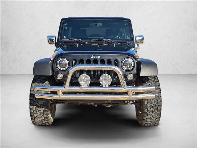 used 2014 Jeep Wrangler Unlimited car, priced at $17,638