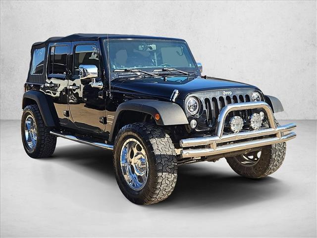 used 2014 Jeep Wrangler Unlimited car, priced at $17,638