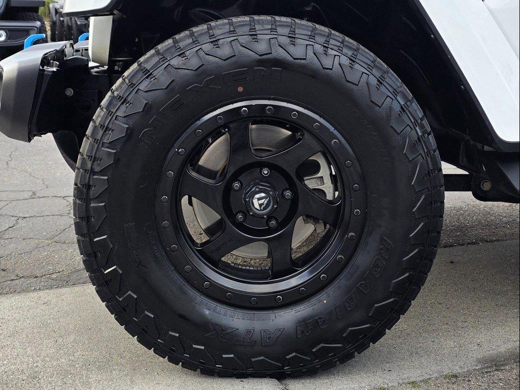 used 2023 Jeep Wrangler 4xe car, priced at $27,900