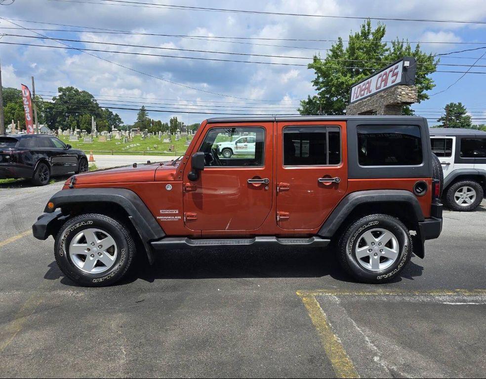 used 2014 Jeep Wrangler Unlimited car, priced at $15,990