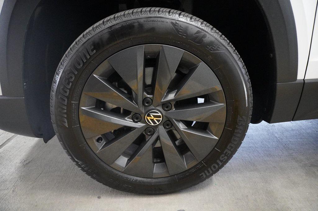 used 2023 Volkswagen Taos car, priced at $19,900