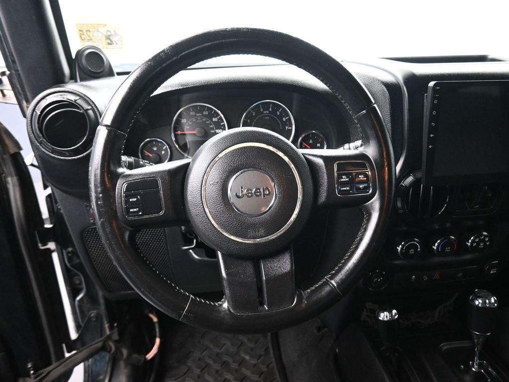 used 2012 Jeep Wrangler Unlimited car, priced at $12,988
