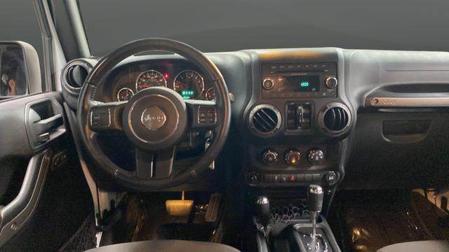 used 2016 Jeep Wrangler Unlimited car, priced at $19,393