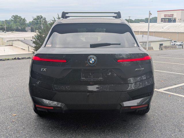 used 2024 BMW iX car, priced at $58,796