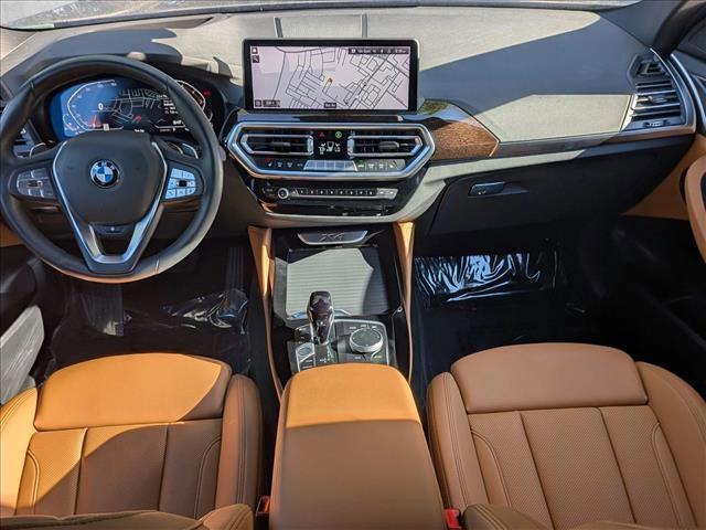 used 2025 BMW X4 car, priced at $50,396