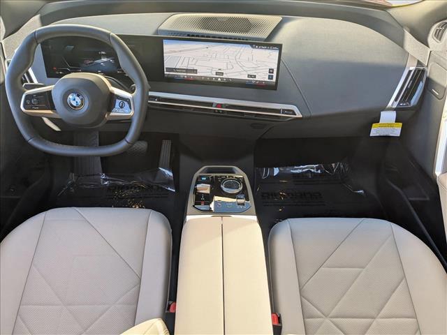 new 2026 BMW iX car, priced at $92,875