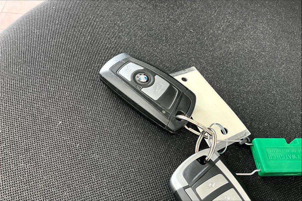 used 2015 BMW 228 car, priced at $12,700