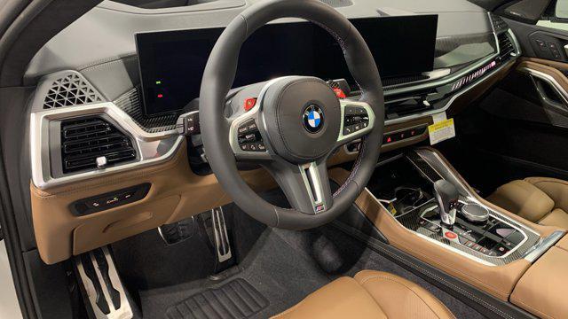 new 2026 BMW X6 M car, priced at $144,915