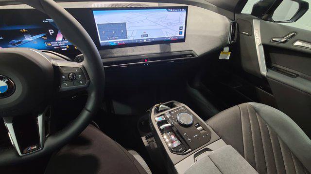 new 2026 BMW iX car, priced at $85,400