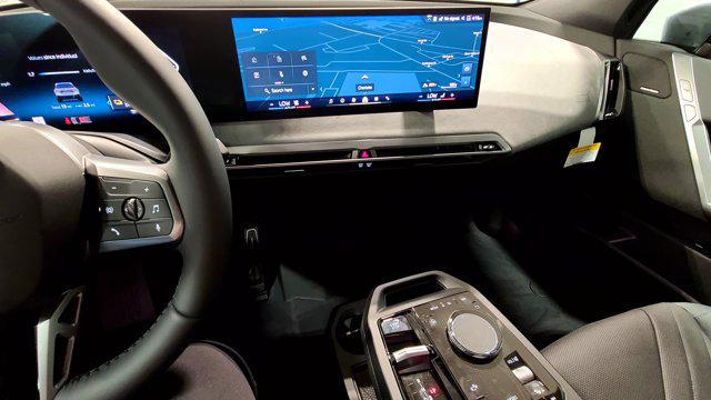 new 2026 BMW iX car, priced at $88,220