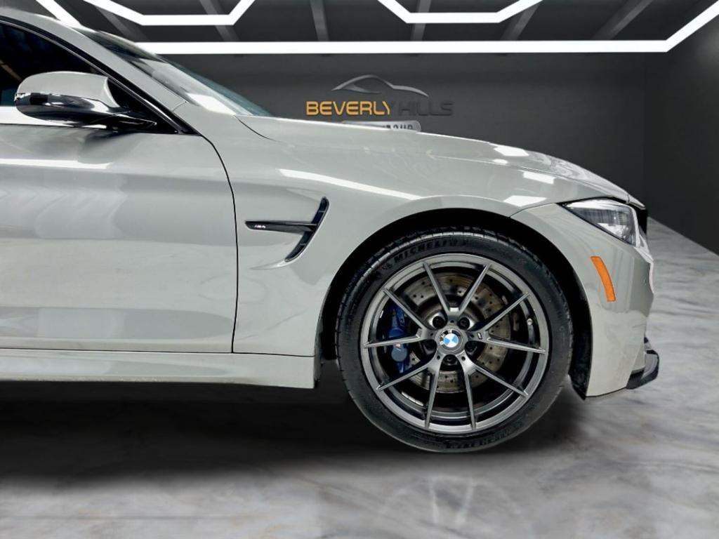 used 2019 BMW M4 car, priced at $55,350