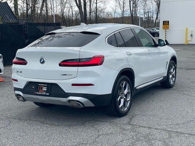 used 2023 BMW X4 car, priced at $42,247