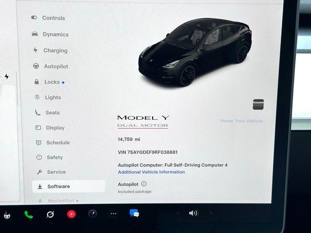 used 2024 Tesla Model Y car, priced at $40,447