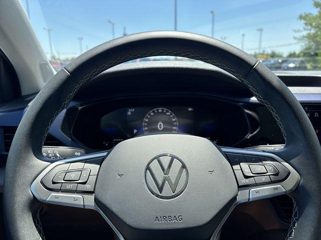 used 2023 Volkswagen Taos car, priced at $22,448