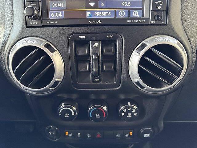 used 2015 Jeep Wrangler Unlimited car, priced at $12,950