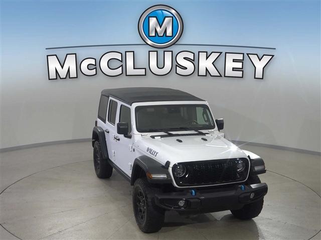 used 2024 Jeep Wrangler 4xe car, priced at $40,387