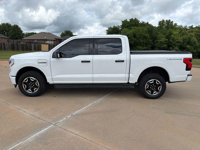 used 2023 Ford F-150 Lightning car, priced at $38,997
