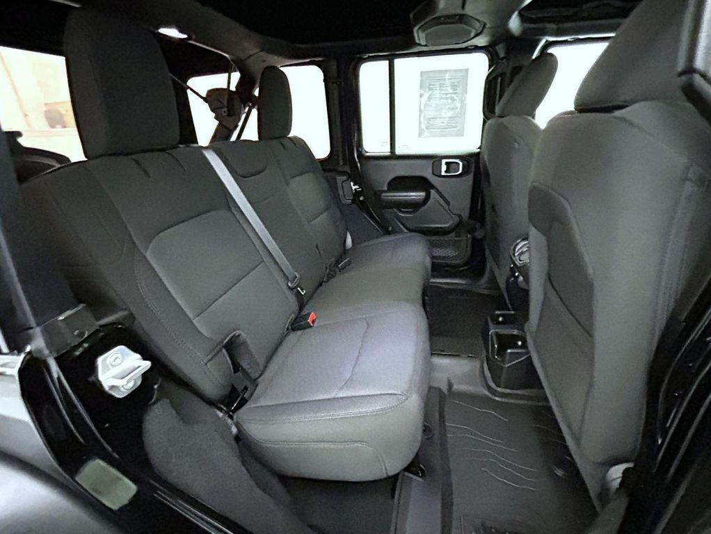used 2023 Jeep Wrangler car, priced at $35,497