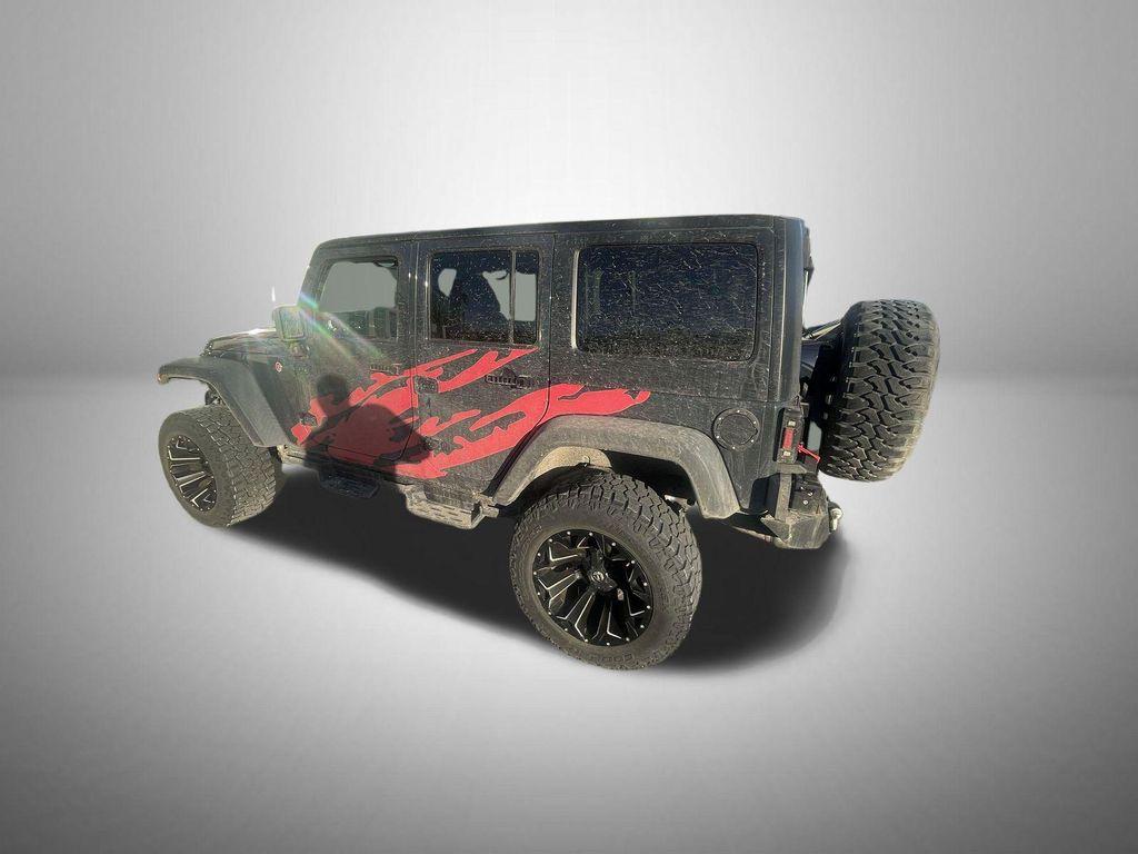 used 2016 Jeep Wrangler Unlimited car, priced at $23,715