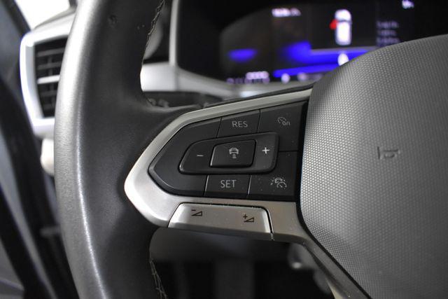 used 2025 Volkswagen Taos car, priced at $22,999