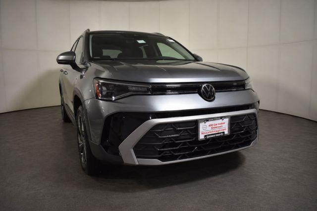 used 2025 Volkswagen Taos car, priced at $22,999