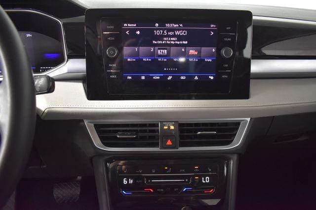 used 2025 Volkswagen Taos car, priced at $22,999
