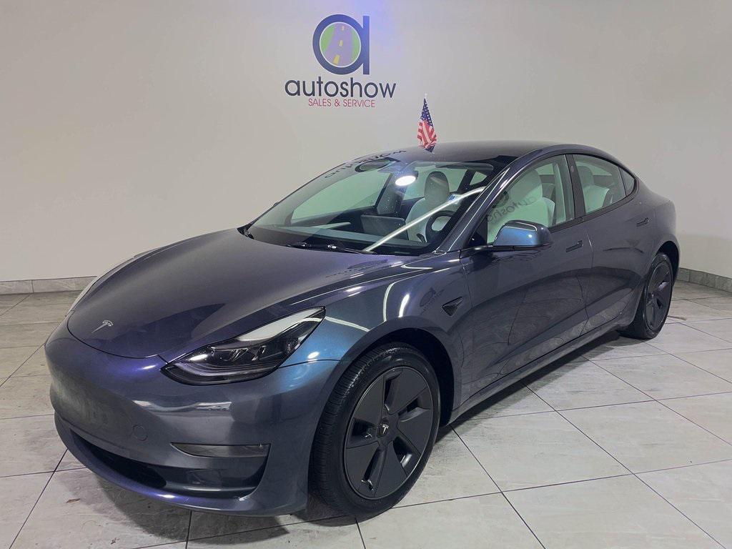 used 2023 Tesla Model 3 car, priced at $21,999