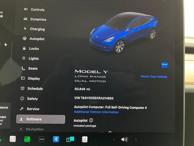 used 2024 Tesla Model Y car, priced at $29,595