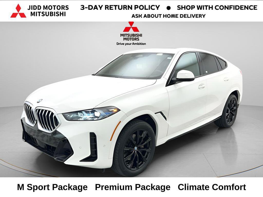 used 2025 BMW X6 car, priced at $62,398