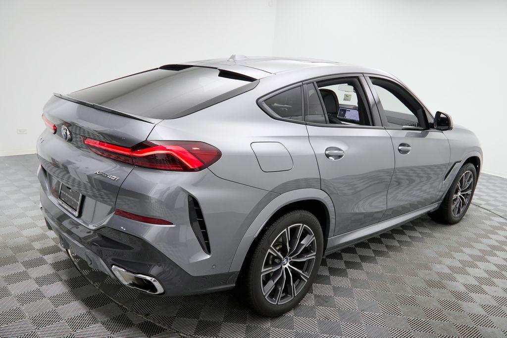 used 2025 BMW X6 car, priced at $58,895