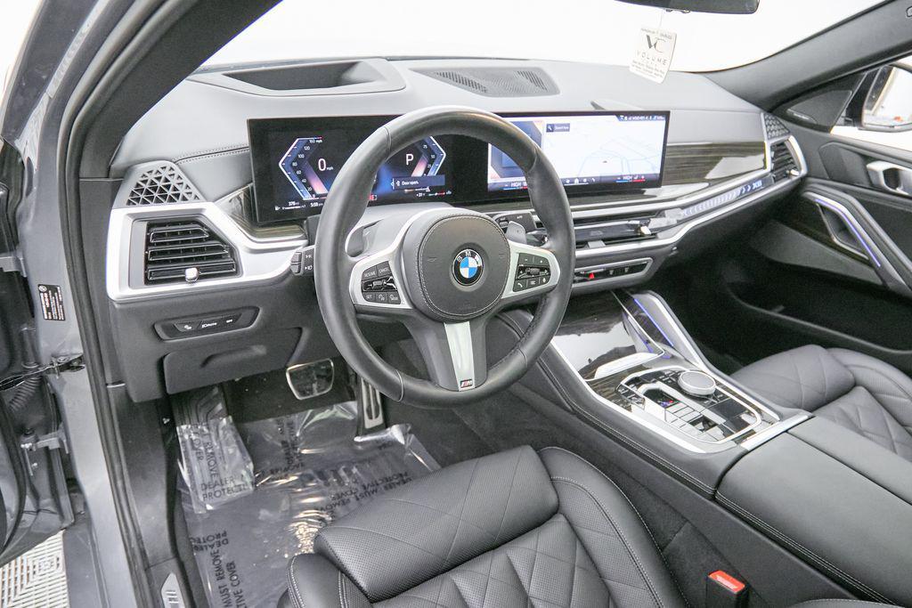 used 2025 BMW X6 car, priced at $58,895