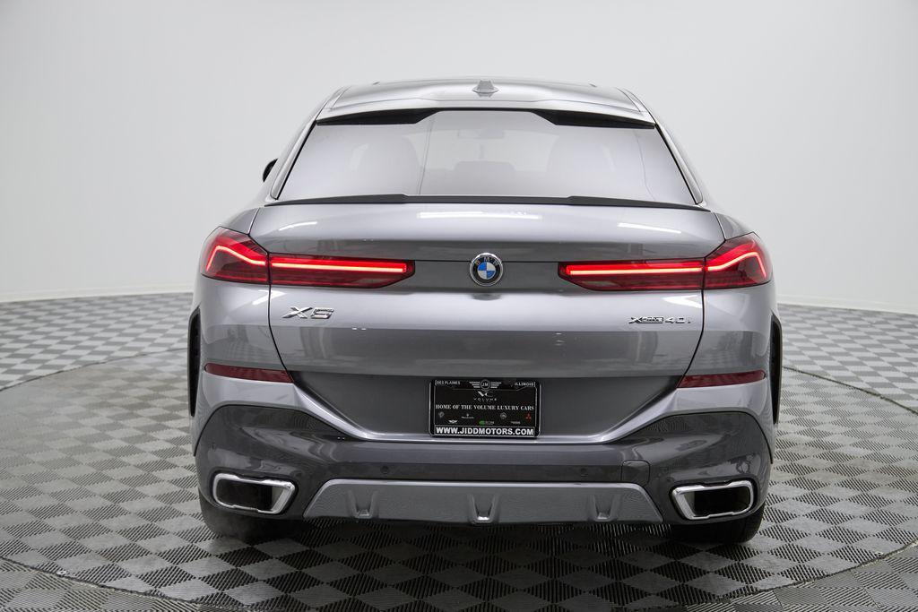 used 2025 BMW X6 car, priced at $58,895