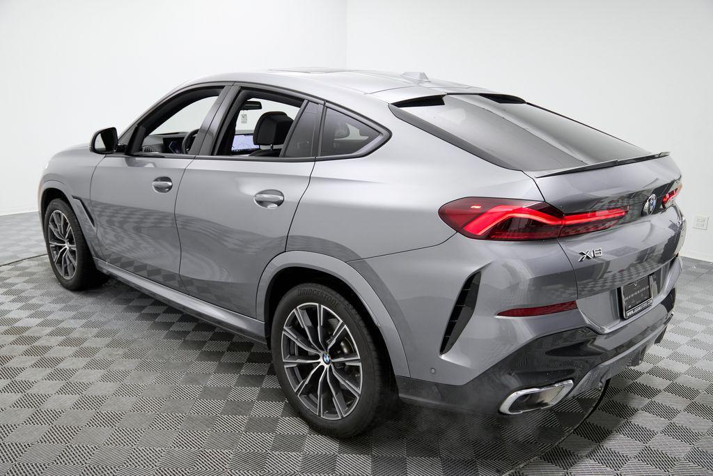 used 2025 BMW X6 car, priced at $58,895