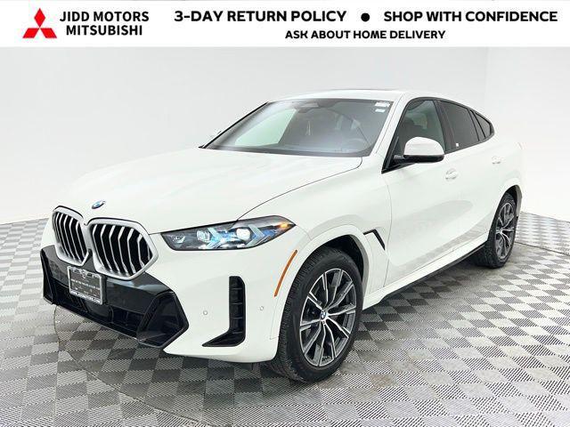 used 2025 BMW X6 car, priced at $67,895