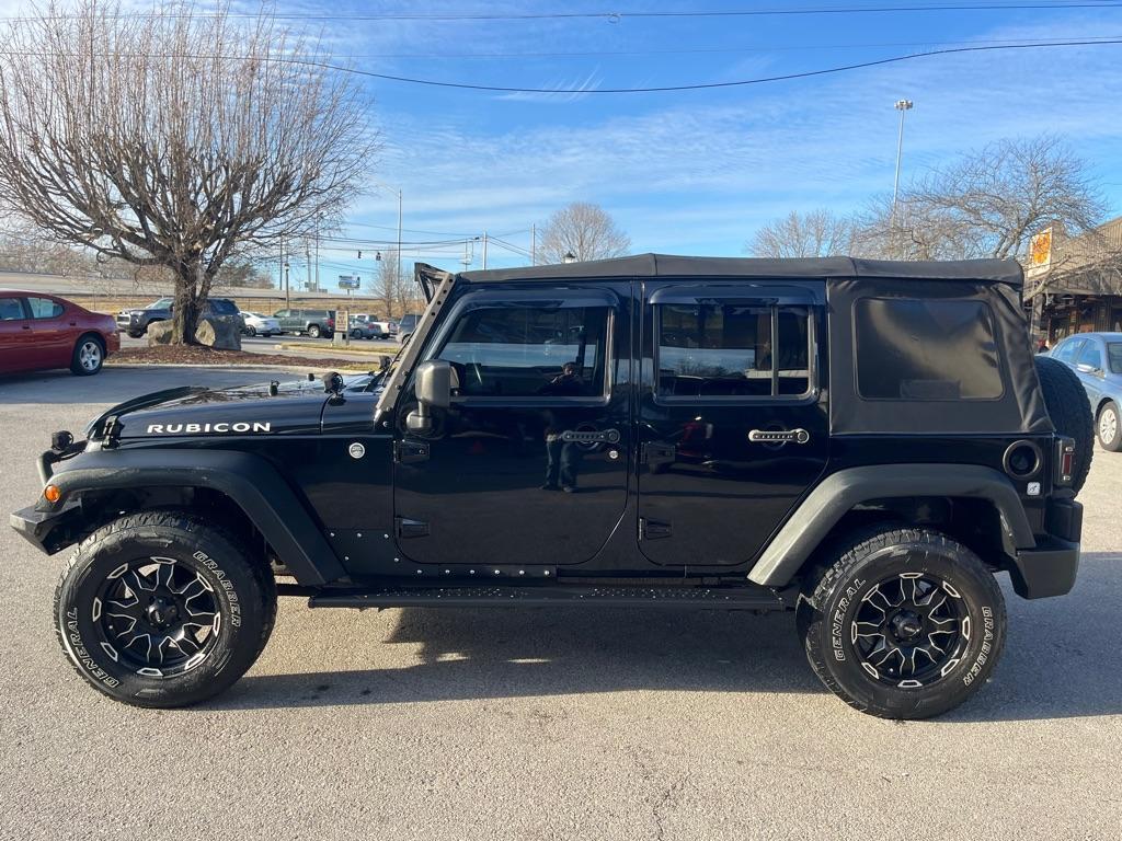 used 2015 Jeep Wrangler Unlimited car, priced at $16,999
