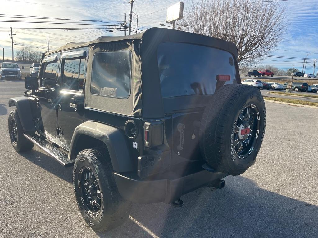 used 2015 Jeep Wrangler Unlimited car, priced at $16,999