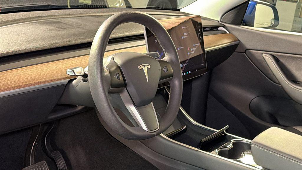 used 2021 Tesla Model Y car, priced at $28,497