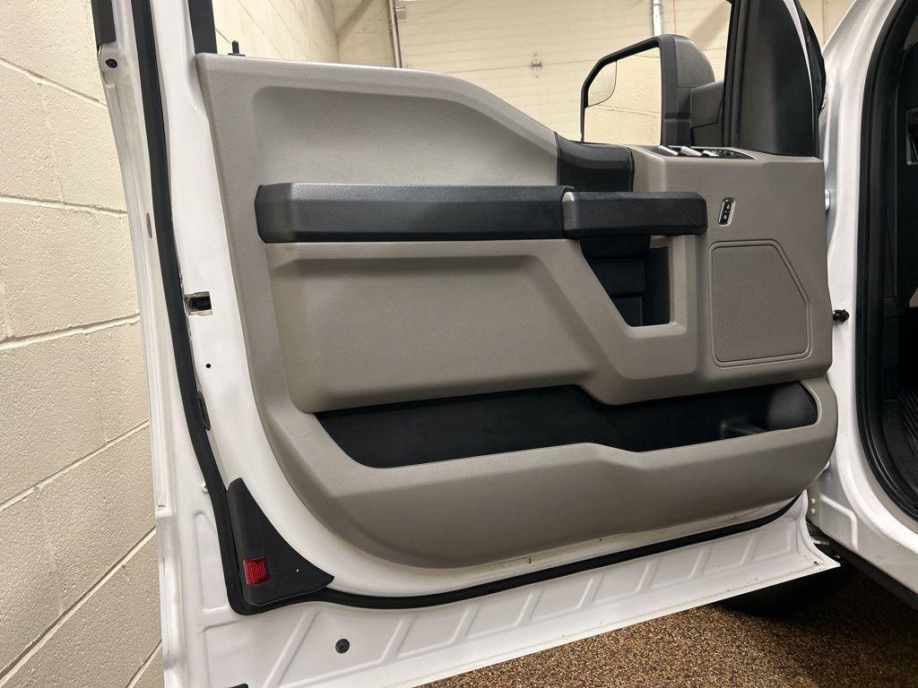 used 2015 Ford F-150 car, priced at $14,000