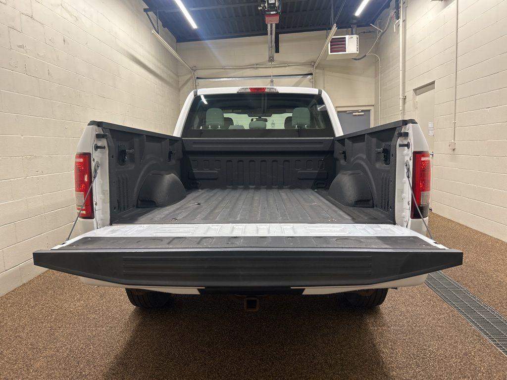 used 2015 Ford F-150 car, priced at $14,000