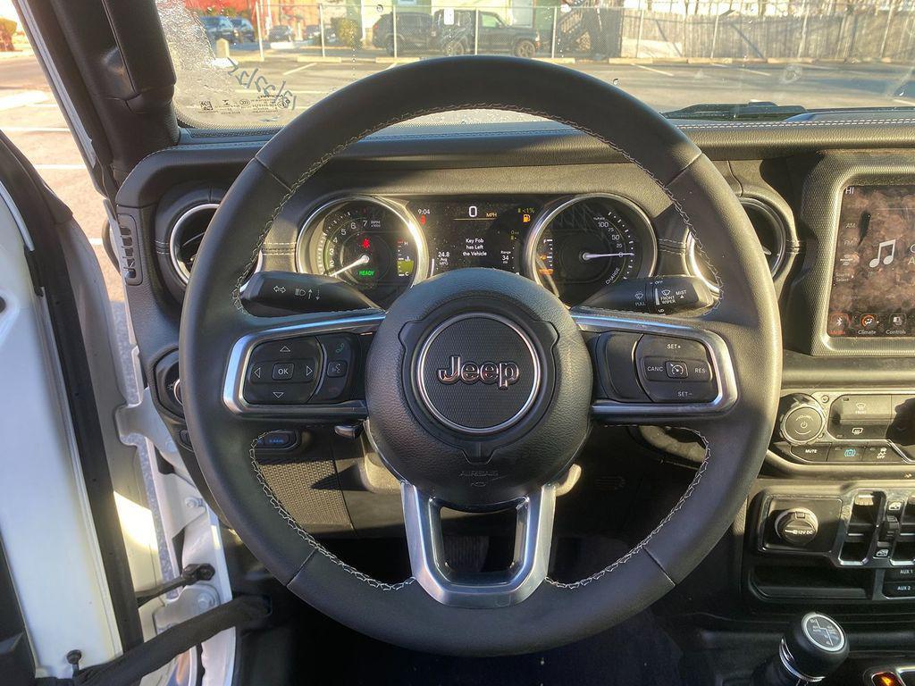 used 2023 Jeep Wrangler 4xe car, priced at $28,988