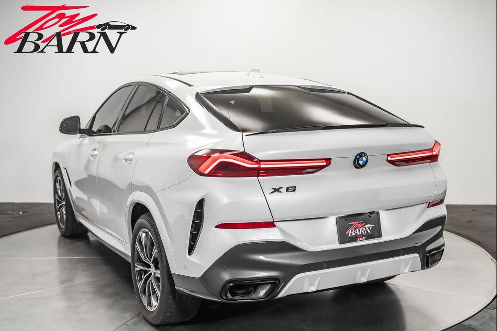 used 2022 BMW X6 car, priced at $48,900