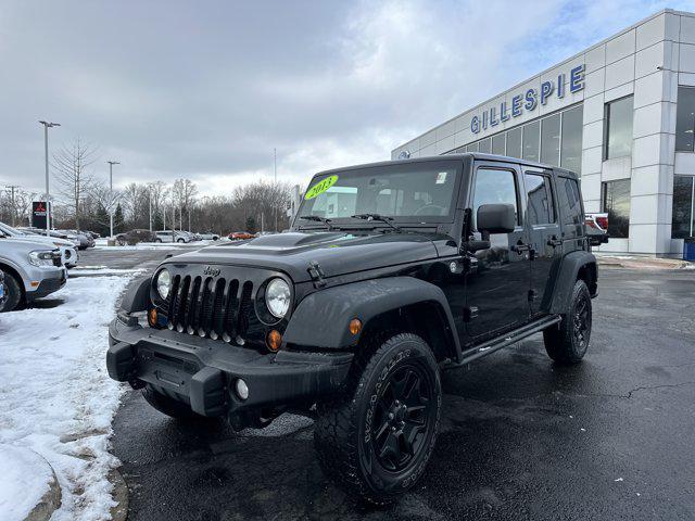 used 2013 Jeep Wrangler Unlimited car, priced at $13,990