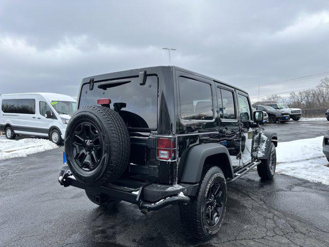 used 2013 Jeep Wrangler Unlimited car, priced at $13,990