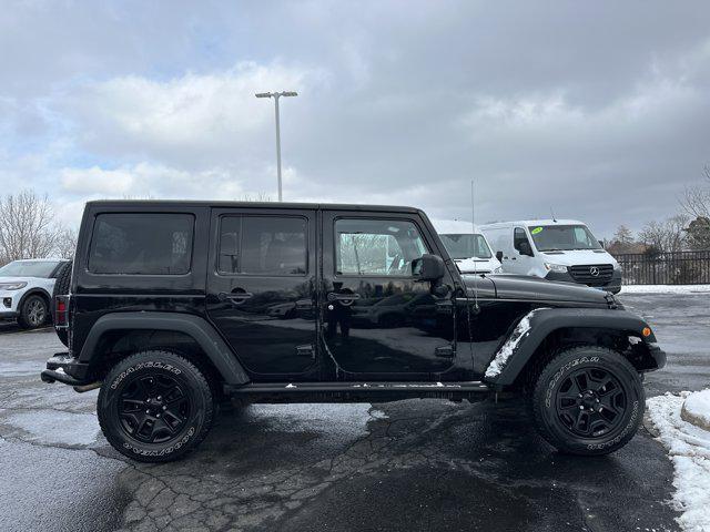 used 2013 Jeep Wrangler Unlimited car, priced at $13,990
