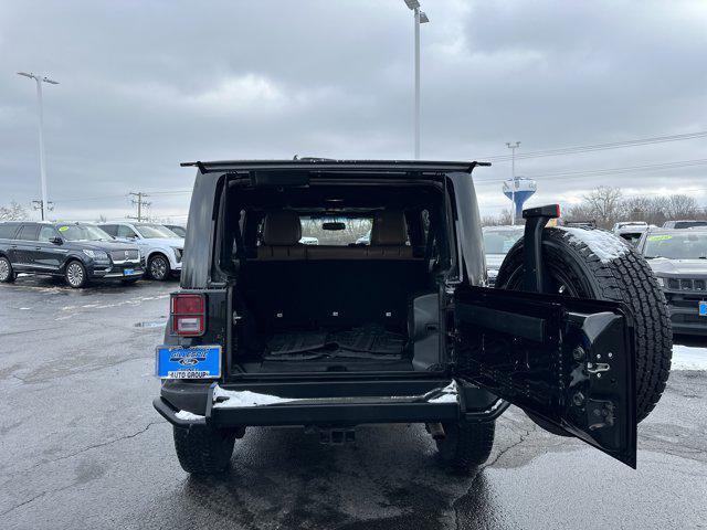 used 2013 Jeep Wrangler Unlimited car, priced at $13,990